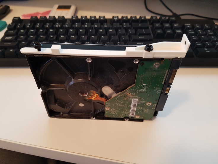 Printed brackets mounted on HDD